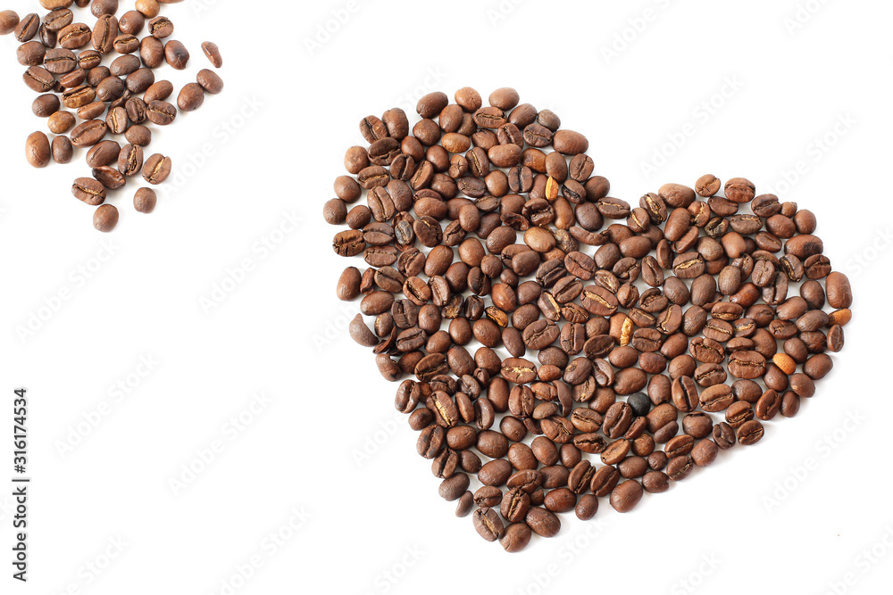 Coffee beans. Heart made from coffee beans on a white background. brown Coffee beans. Heart made from coffee beans on a white background. brown