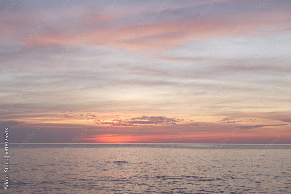 Sea pink sunset. Beautiful color clouds. Sea pink sunset. Beautiful color clouds.