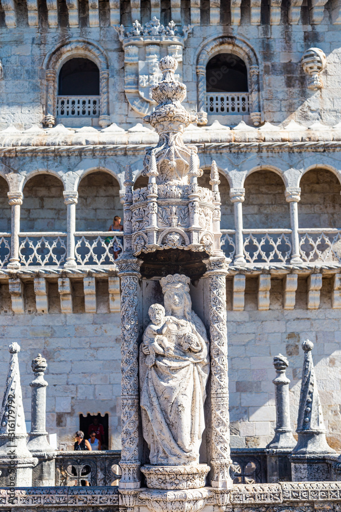 Sculpture of the virgin Mary and her child in the courtyard of the Belem Tower in Lisbon