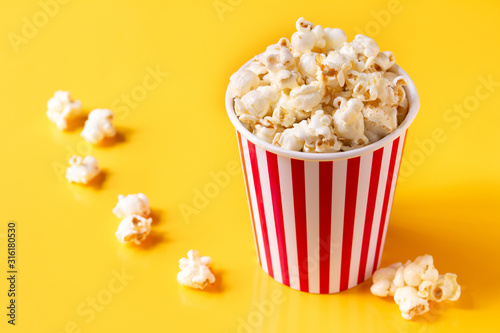 .popcorn blast cinema box with corn bucket on yellow isolated