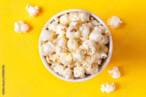 popcorn blast top view cinema box with corn bucket on yellow  isolated