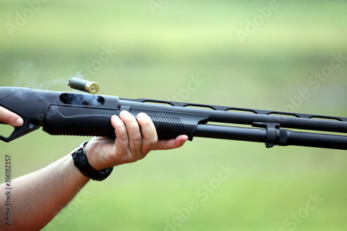 Shotgun with ejecting cartridge