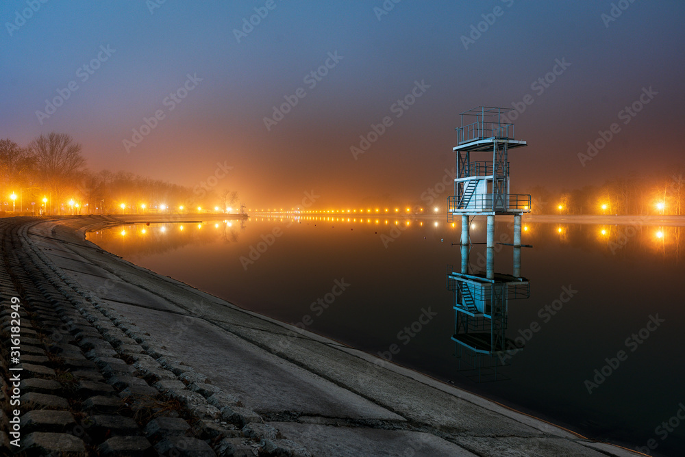 Winter misty night over rowing channel in Plovdiv city, Bulgaria