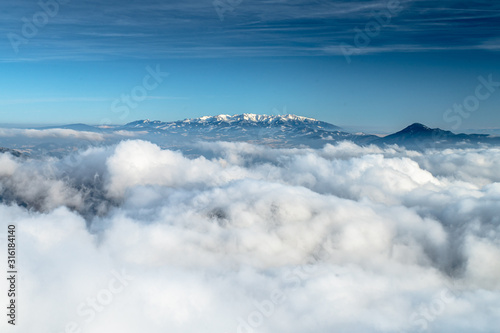 Clouds, winter mountains. Blue sky. High Quality Photo © kovop58