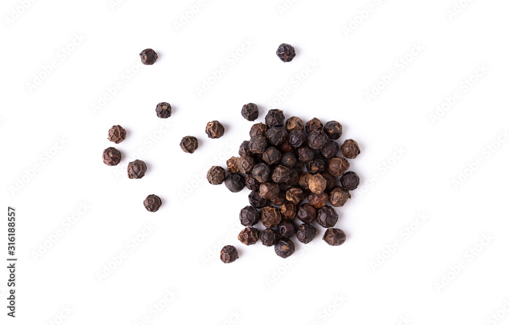 Black pepper viewed from above on white background. Flat lay Black pepper viewed from above on white background. Flat lay