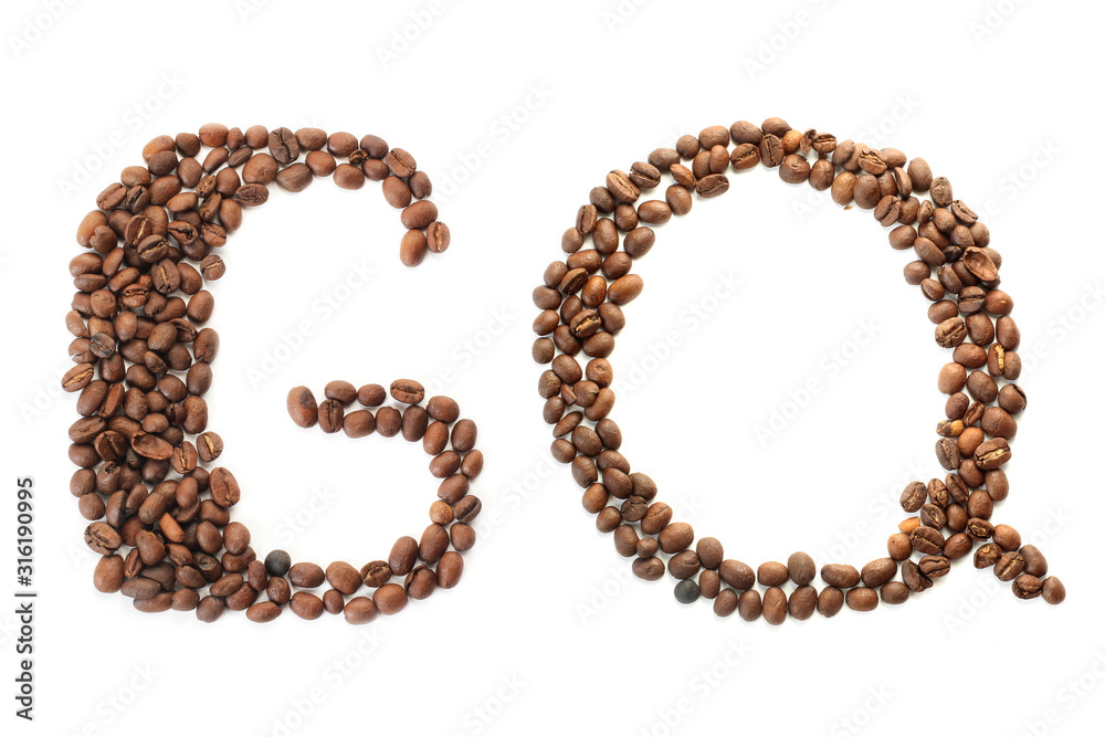 Coffee beans. The inscription GQ from coffee beans on a white background. brown Coffee beans. The inscription GQ from coffee beans on a white background. brown