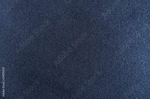 Texture of simple navy blue jersey fabric