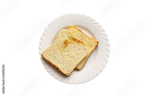 Plate with toasted bread isolated on white background, top view