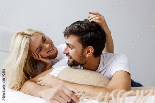 Happy together. Love. Fun. Emotions. Young couple are hugging and laughing