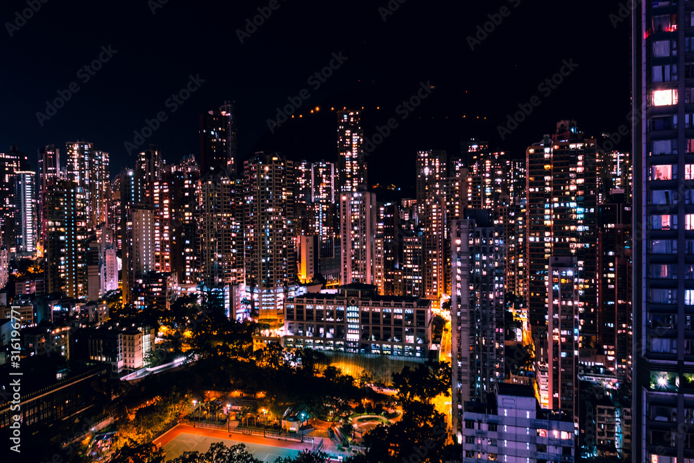 Fototapeta premium city skyline at night, city lights in downtown Hong Kong