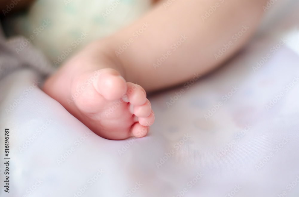 small foot of a baby close up