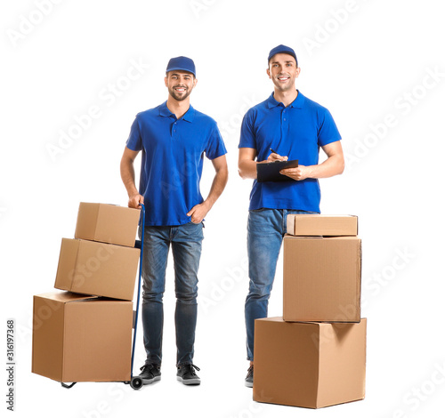 Delivery men with boxes on ...