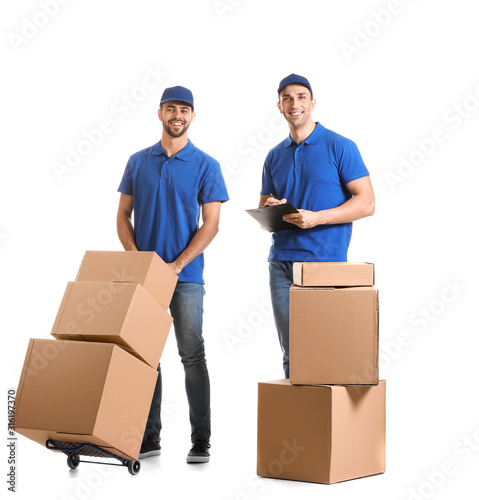 Delivery men with boxes on ...