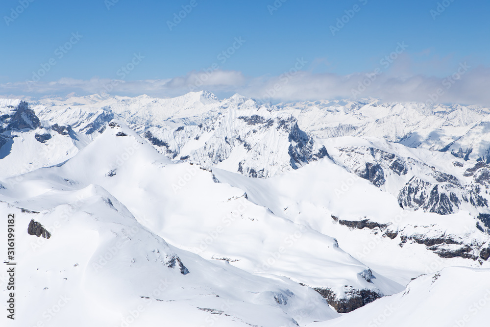 Winter landscape, Mountains covered by snow with clear blue sky in sunnyday winter in Switzerland