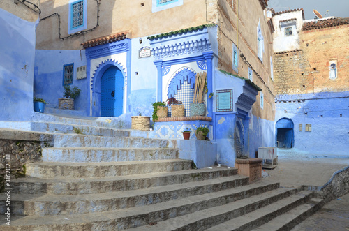Beautiful staircase of old medina Chefchaouen.  It is the chief town of the province of the same name, and is noted for its buildings in shades of blue. © peacefoo