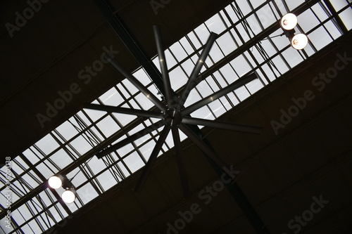 large industrial ceiling fan in a warehouse