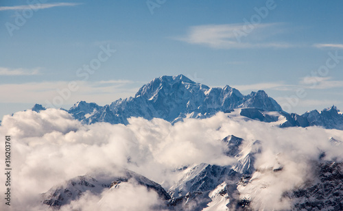 Zermatt mont blanc sea of clouds in valley mountain emerging view perfect sky