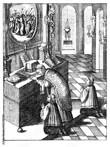 Antique vintage religious engraving or drawing of praying priest and two altar boys in church celebrating mass. Illustration from Book Die Betrubte Und noch Ihrem Beliebten..., Austrian Empire,1716 photo