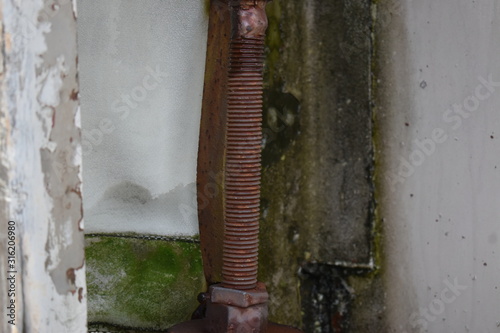 Rusted threaded bolt on vintage equipment