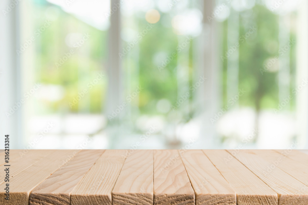Empty wooden table and interior background, product display,blurred store with bokeh - obrazy, fototapety, plakaty 