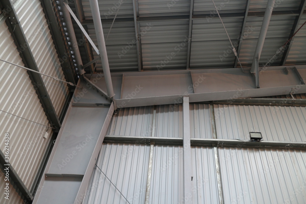 gray walls of industrial metal hangar gray walls of industrial metal hangar