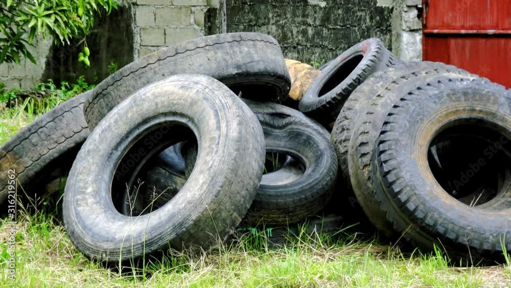 Pile of Old Tires Abandoned on garbage dump Pile of Old Tires Abandoned on garbage dump