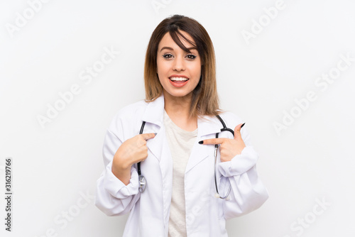 Young doctor woman over isolated background with surprise facial expression