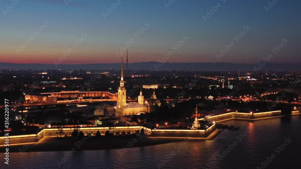 Aerial night view of Peter and Paul Fortress with cityscape, Saint-Petersburg, Russia, 4k Aerial night view of Peter and Paul Fortress with cityscape, Saint-Petersburg, Russia, 4k