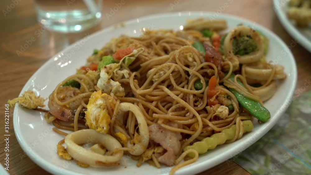 stir-fried noodles with seafood and vegetable stir-fried noodles with seafood and vegetable