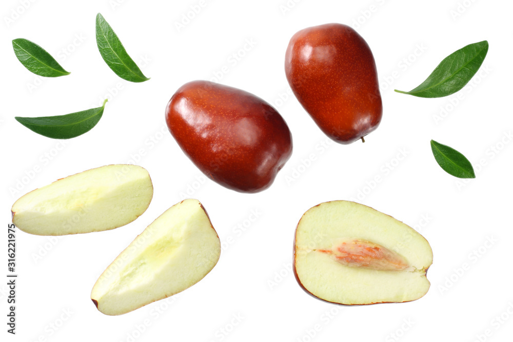 fresh date fruit with sleces and leaves isolated on white background. top view fresh date fruit with sleces and leaves isolated on white background. top view