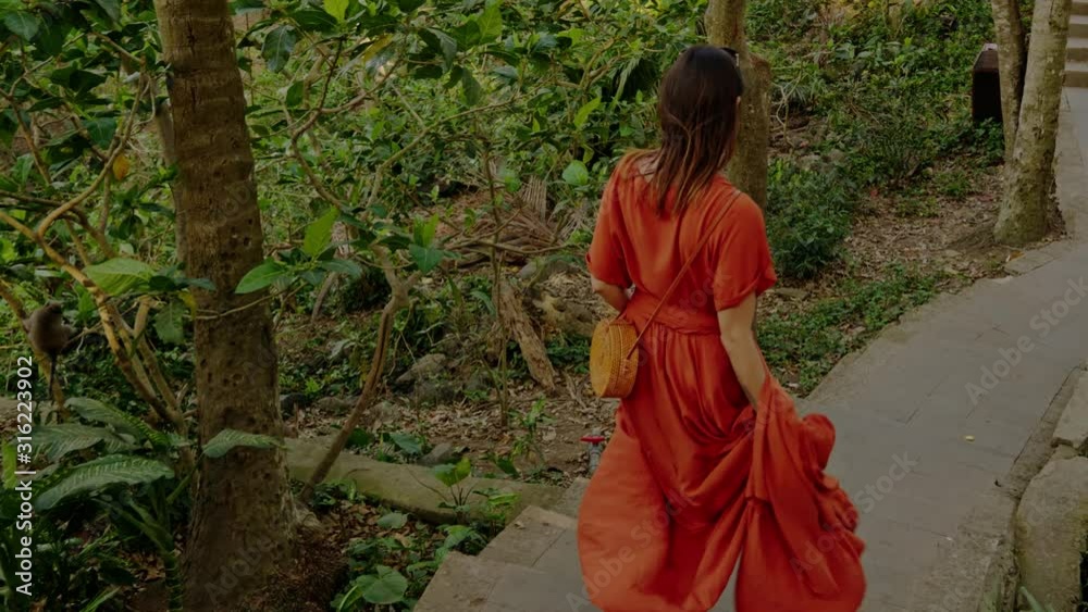 Woman at monkey forest at Ubud, Bali Woman at monkey forest at Ubud, Bali
