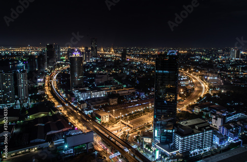 Bangkok cityscape. Bangkok downtown at night view in the business district, Beautiful twilight give the city a modern style. © num