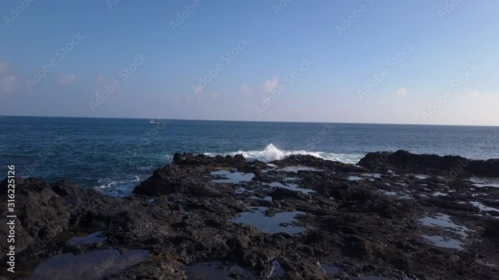 Slow Crawl over Oceanic Reef Out to Sea