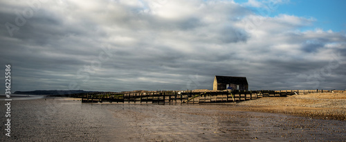 Receding weather front, Rye Harbour, Sussex, England photo