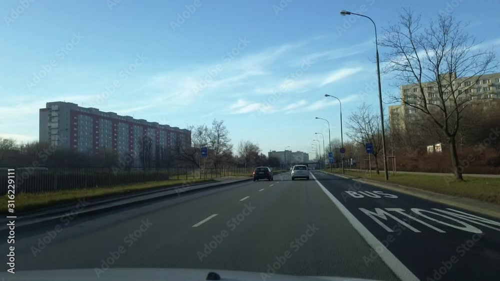 Driving down the streets of Warsaw Poland on the highway road timelapse