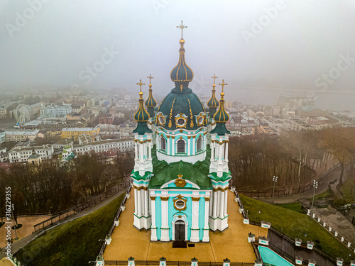 Aerial view. St. Andrew's Church in Kiev in heavy fog.