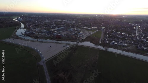 Aerial of the small Dutch town Ulft in Holland at sunset photo