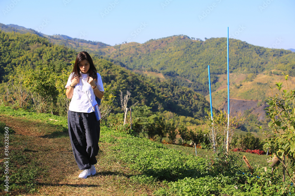 trekking girl in the countryside 