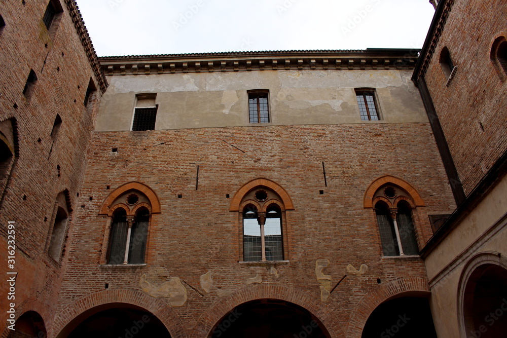 Fototapeta premium The facade of an internal courtyard of the Ducal Palace of Mantua