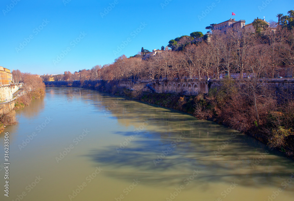 view of flowing Tiber river in Rome 
