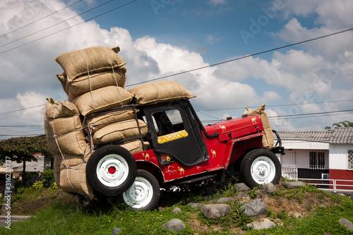 Armenia, Quindio, Coffee Axis, Colombia. April 14, 2010: Jeep Willys in the field photo