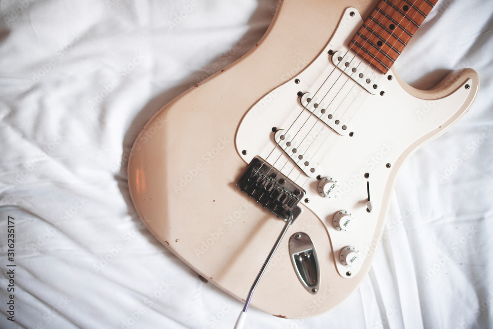 Naklejka premium guitar on white background