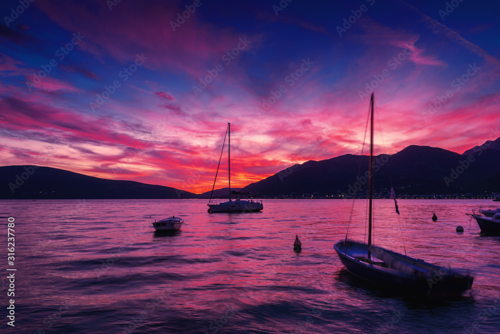 Sunset view of Kotor bay and mountains near Tivat, Montenegro.