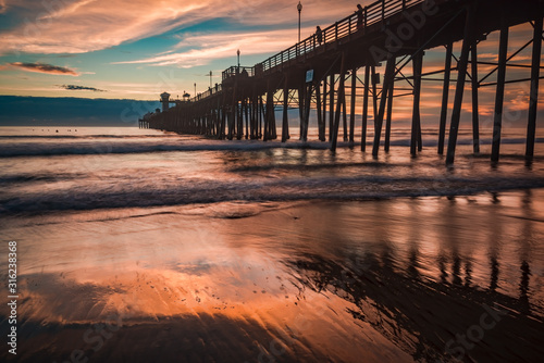 Long exposure sunset and surf at the pier