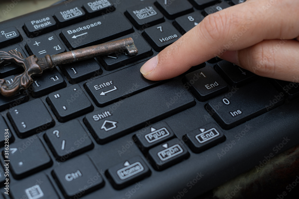 Close up female Index finger push button Enter on the computer keyboard Close up female Index finger push button Enter on the computer keyboard