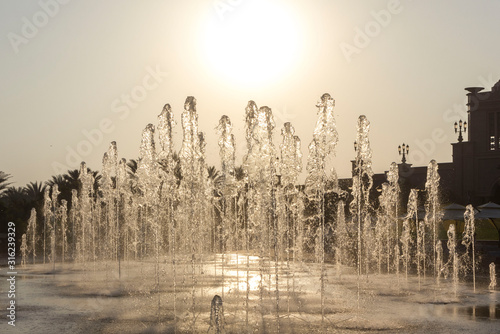sunset view of the majestic fountains of Emirates Palace