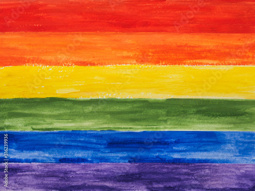 Beautiful postcard with a rainbow flag. Top view, close up