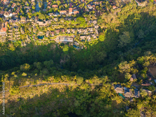 Aerial top view of Campuhan Ridge Walk, Quiet morning scenic Green Hill in Ubud Bali, Indonesia