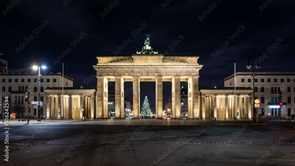 Illuminated Brandenburg Gate at night, Berlin, Germany. Car traffic, time lapse video. Illuminated Brandenburg Gate at night, Berlin, Germany. Car traffic, time lapse video.