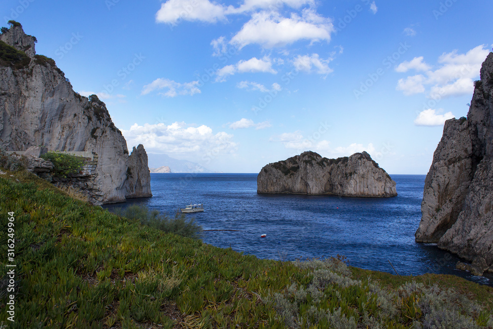 rock in the sea beautiful panoramic beach island blue water view tourism travel 